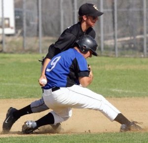 Kevin tags out a runner back in high school.