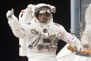 Astronaut Steve Smith Giving A Thumbs Up On The Hubble Space Telescope