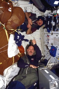 Astronaut Steve Smith Sleeping In Space On A Wall